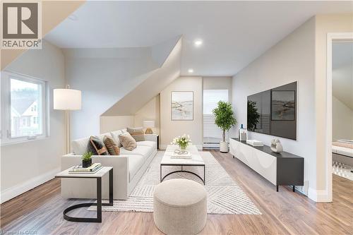 Staged Living Room Upper unit - 152 Sanford Avenue S, Hamilton, ON - Indoor Photo Showing Living Room