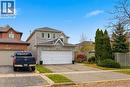 Traditional home featuring a garage and driveway - 3372 Bobwhite Mews, Mississauga, ON 