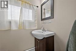 Bathroom featuring vanity and healthy amount of natural light - 