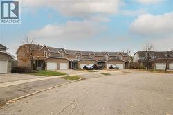 Traditional-style house with a garage and driveway - 