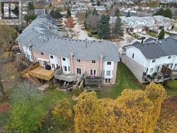 Aerial view of back side of home and residential area - 