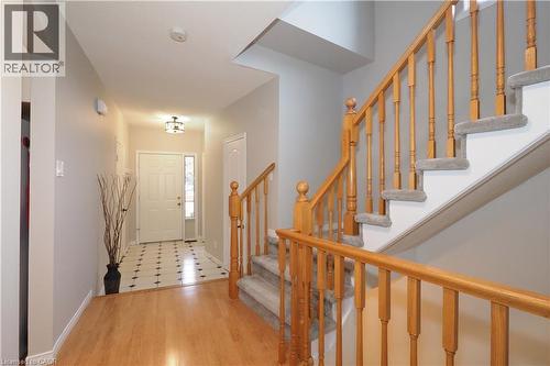 View of foyer entrance and stairs to second floor from just inside the main floor living area - 511 Oakvale Drive Unit# 1, Waterloo, ON - Indoor Photo Showing Other Room