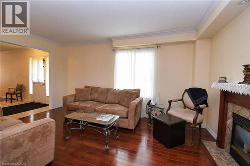 7 Southside Place Unit# 49, Hamilton, ON - Indoor Photo Showing Living Room With Fireplace