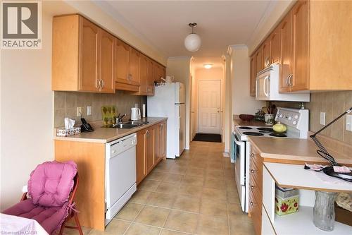 7 Southside Place Unit# 49, Hamilton, ON - Indoor Photo Showing Kitchen With Double Sink