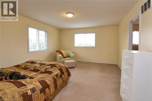 7 Southside Place Unit# 49, Hamilton, ON - Indoor Photo Showing Bedroom
