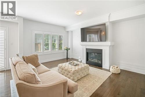 7 Windsor Circle, Niagara-On-The-Lake, ON - Indoor Photo Showing Living Room With Fireplace