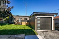 Re-done garage to match ADU with new automatic garage door - 