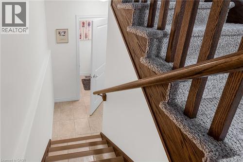 Stairs to 2 pc bathroom and lower level - 45 Hemlock Way, Grimsby, ON - Indoor Photo Showing Other Room