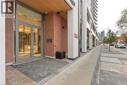 View of exterior entry with brick siding and french doors - 