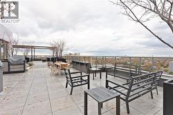 View of patio / terrace with area for grilling and outdoor dining space - 