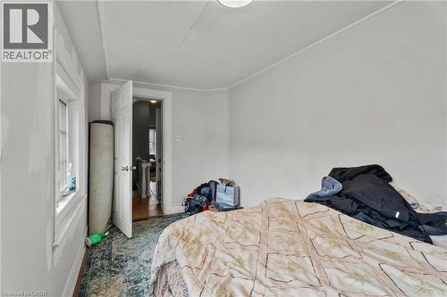 Bedroom with carpet and lofted ceiling - 246 Mary Street, Hamilton, ON 