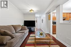 Living area with dark wood finished floors - 