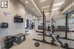 Exercise room featuring recessed lighting and visible vents - 