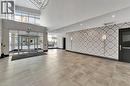 Community lobby featuring recessed lighting and a towering ceiling - 85B Morrell Street Unit# 117, Brantford, ON  - Indoor Photo Showing Other Room 
