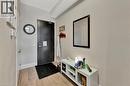 Foyer entrance with light wood finished floors and baseboards - 85B Morrell Street Unit# 117, Brantford, ON  - Indoor Photo Showing Other Room 