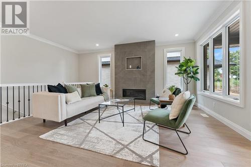 107 Judd Drive, Simcoe, ON - Indoor Photo Showing Living Room With Fireplace