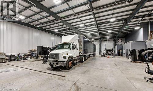 Garage featuring metal wall - 55 Progress Drive E, Aylmer, ON 