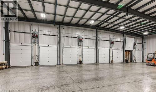 Garage with metal wall - 55 Progress Drive E, Aylmer, ON 