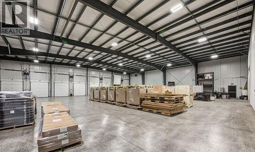 Garage with metal wall - 55 Progress Drive E, Aylmer, ON 