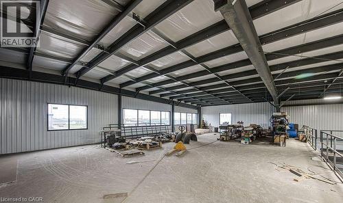 Miscellaneous room featuring metal wall and a garage - 55 Progress Drive E, Aylmer, ON 