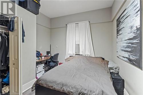 Bedroom featuring wood finished floors - 181 West Avenue N, Hamilton, ON - Indoor Photo Showing Bedroom