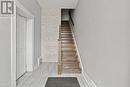 Stairway with tile patterned floors and visible vents - 181 West Avenue N, Hamilton, ON  - Indoor Photo Showing Other Room 