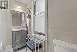 Bathroom with toilet and vanity - 