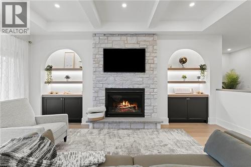 637 Buffalo Road, Fort Erie, ON - Indoor Photo Showing Living Room With Fireplace