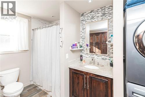 Four piece ensuite main floor primary bedroom with laundry - 199 Kimberly Drive, Hamilton, ON - Indoor Photo Showing Bathroom