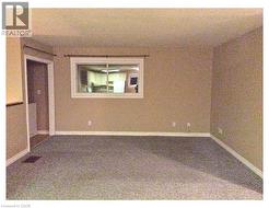Photos taken prior to current tenant residing in the unit - Apartment B - Second floor rental - Living Room - 