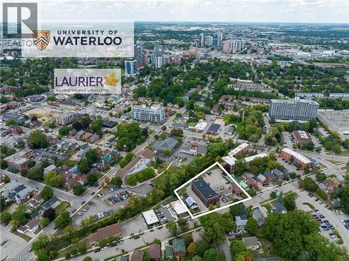Aerial view of property's location with nearby urban area and property parcel outlined - 30-40 Laurel Street, Waterloo, ON -  With View