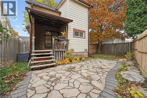 Back of property featuring a fenced backyard, a wooden deck, and a patio area - 41 Rose Street, Kitchener, ON - Outdoor With Deck Patio Veranda