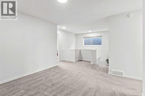 38 Seton Parade Se, Calgary, AB - Indoor Photo Showing Other Room