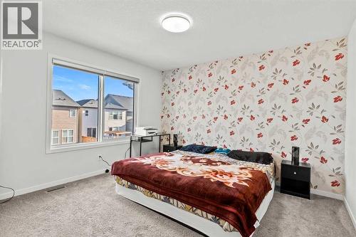 38 Seton Parade Se, Calgary, AB - Indoor Photo Showing Bedroom