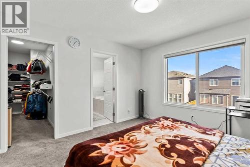 38 Seton Parade Se, Calgary, AB - Indoor Photo Showing Bedroom