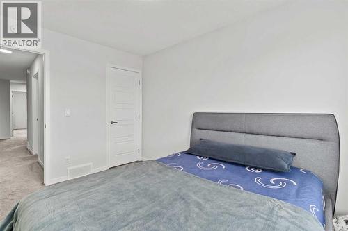 38 Seton Parade Se, Calgary, AB - Indoor Photo Showing Bedroom