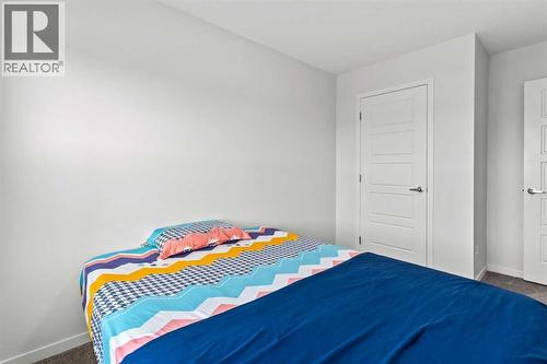 38 Seton Parade Se, Calgary, AB - Indoor Photo Showing Bedroom