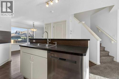 512 Evanston Drive Nw, Calgary, AB - Indoor Photo Showing Kitchen With Double Sink