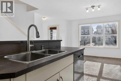 512 Evanston Drive Nw, Calgary, AB - Indoor Photo Showing Kitchen With Double Sink
