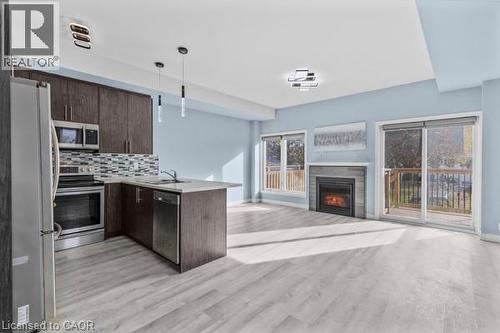 37 Delena Avenue S, Hamilton, ON - Indoor Photo Showing Kitchen With Fireplace