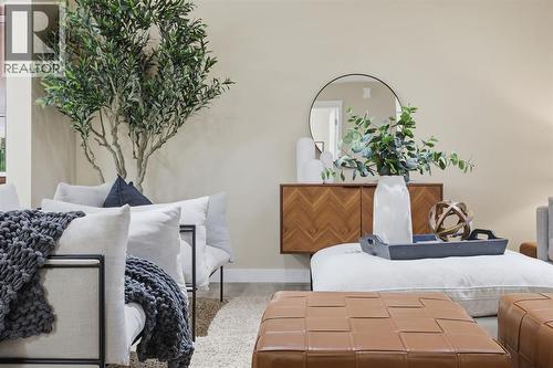 117 Panatella Park Nw, Calgary, AB - Indoor Photo Showing Bedroom