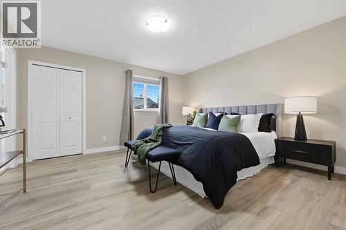 117 Panatella Park Nw, Calgary, AB - Indoor Photo Showing Bedroom