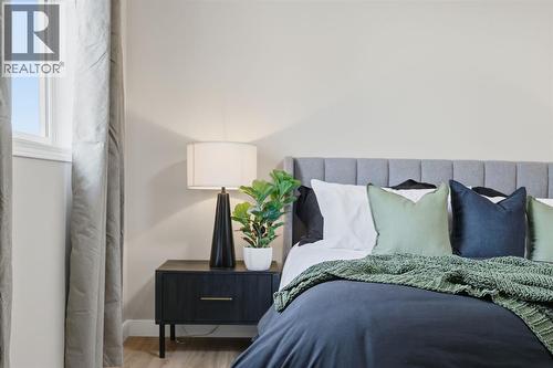 117 Panatella Park Nw, Calgary, AB - Indoor Photo Showing Bedroom