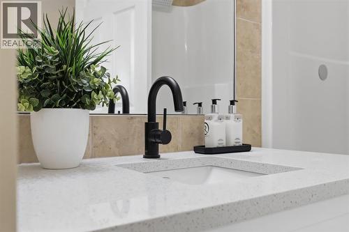 117 Panatella Park Nw, Calgary, AB - Indoor Photo Showing Bathroom