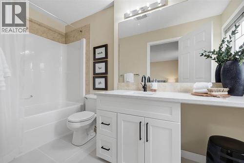 Updated bathrooms throughout - 117 Panatella Park Nw, Calgary, AB - Indoor Photo Showing Bathroom