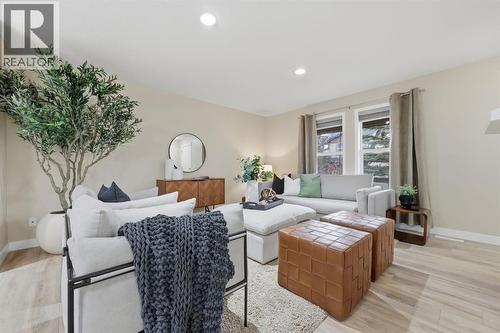 117 Panatella Park Nw, Calgary, AB - Indoor Photo Showing Living Room