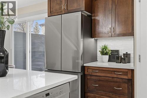 117 Panatella Park Nw, Calgary, AB - Indoor Photo Showing Kitchen