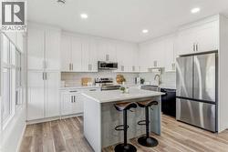 Plenty of cupboard space and expansive windows that brighten the space beautifully - 