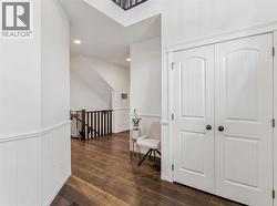 Beautiful front entry with wainscotting accents - 