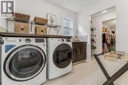 Upper Floor Laundry Room with Counter & a Sink - 